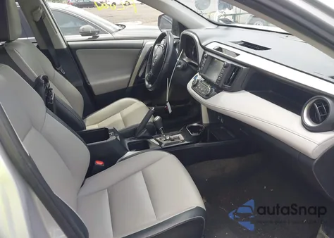 2016 Toyota Rav4 Hybrid Limited z USA, uszkodzony, nr VIN JTMDJREV6GD031344